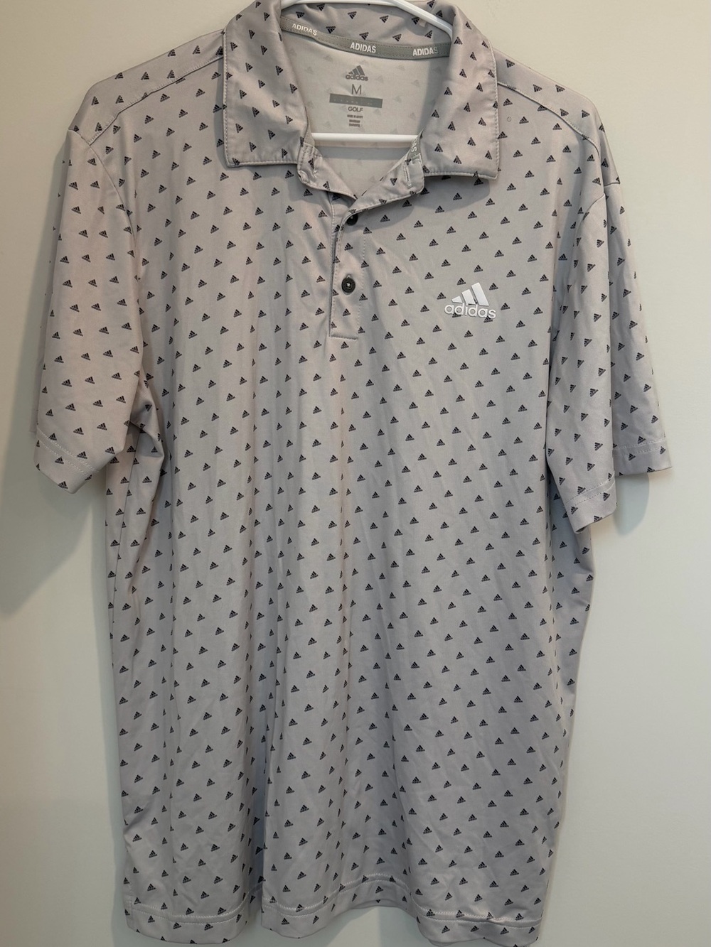 adidas Men’s Light Gray Polo with Small Black Triangle Print